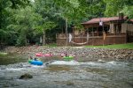 Relax while watching the tubers go down the river